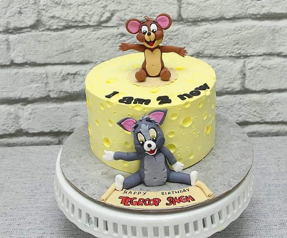 Tom and Jerry themed birthday cake for baby Adam… | Instagram